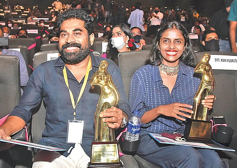 Best actors Suraj Venjarammoodu and Kani Kusruthi with the awards at the state film award function at Tagore theatre in Thiruvananthapuram on Friday | B P Deepu