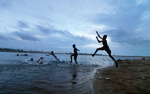 While some children spent playing in a huge puddle of stagnant water near Marina beach. (Photo | Sri Loganathan V, EPS)