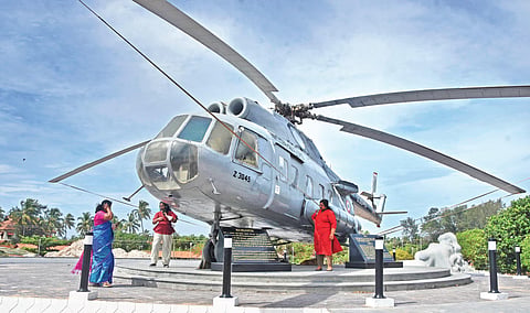 Kanayi Kunhiraman’s Mermaid statue at Shankhumugham alongside which a helicopter has been installed. Placing the helicopter here has kicked up a row | B P Deepu