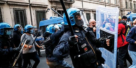Italian police is riot gear disperse protestors in Rome. (Photo | AP)