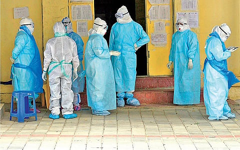 Health workers in personal protective equipment (Photo | Vinod Kumar T, EPS)