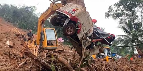 Due to heavy rains, the rescue operations led by National Disaster Response Force (NDRF) team and a dog squad were affected at Kokkayar. (Photo | Albin Mathew)