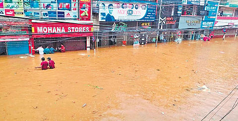 Shops and establishments in Kanjirappally town which were almost submerged after Chittar river breached its banks following heavy rain on Saturday | Express