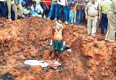 Charred remains of a body, suspected to be of Mamita Meher, being recovered on the premises of Mahaling stadium. (Photo | Express)