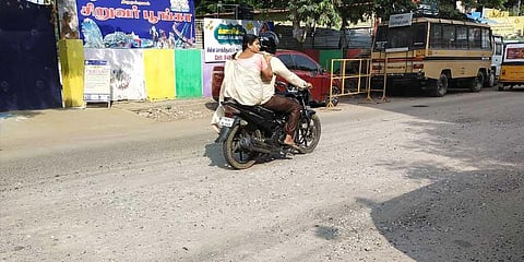 Madurai: Commuters drive on the road to trouble