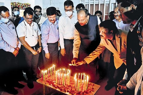 Chief Secretary Somesh Kumar, Director of Public Health G Srinivasa Rao and other officials cut a cake in celebration of the State’s vaccine milestone. (Photo | S Senbagapandiyan, EPS)