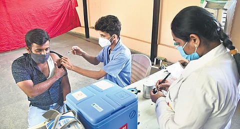 A health worker administers Covid vaccine in Bengaluru. (File Photo | Ashishkrishna HP, EPS)