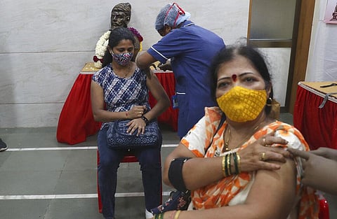 A health worker administers the vaccine for COVID-19 in Mumbai. (Photo | AP)