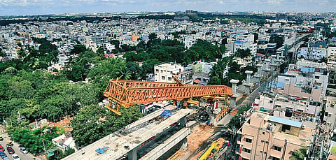 An aerial view of the girder after one of its legs slipped from a pier during construction work at BTM Layout, on Sunday.