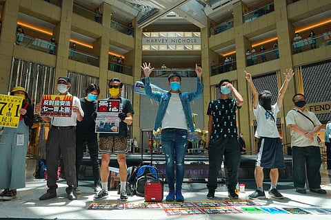 Protesters gather at a shopping mall in Central during a pro-democracy protest against Beijing's national security law in Hong Kong, Tuesday, June 30, 2020. (File Photo | AP)