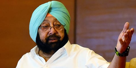 Former Punjab Chief Minister Captain (Retd) Amarinder Singh addresses a press conference, in Chandigarh on Wednesday. (Photo| ANI)