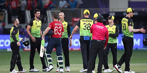 Australian players congratulate England's Jos Buttler during a T20 World Cup match in Dubai. (Photo| AP)