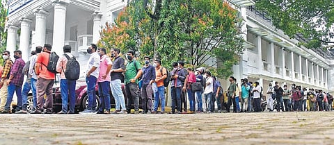 Youngsters standing in queue to take part in the seminar organised by ODEPC at Ernakulam Town Hall.