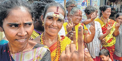 Narikuravar women pose after voting in Tirunelveli on Wednesday | V KARTHIKALAGU
