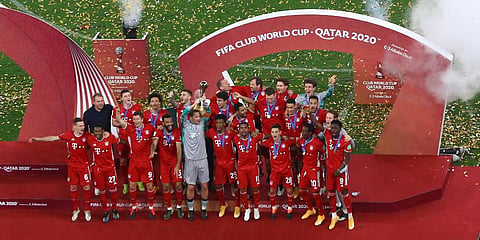 FILE - FC Bayern Munich's goalkeeper Manuel Neuer holds up the Club World Cup trophy at at the Education City stadium in Al Rayyan, Qatar, Thursday, Feb. 11, 2021. (Photo | AP)