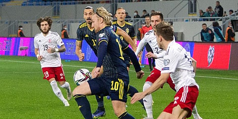 Sweden's Emil Forsberg, centre, in action during the World Cup 2022 group B qualifying soccer match between Georgia and Sweden in Batumi, Georgia, Thursday, Nov. 11, 2021. (Photo | AP)