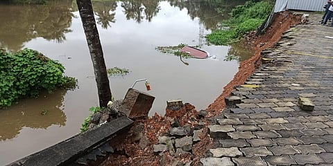 The spot where car fell into the river after the protective wall of the vehicle service center on the national highway collapsed. (Photo| EPS)