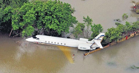 Aerial view of an aircraft submerged in Chennai Airport during 2015 floods | file photo