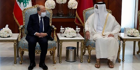 Qatar's Emir Sheikh Tamim bin Hamad Al Thani (R) meets with Lebanese President Michel Aoun, in Doha. (Photo | AP)