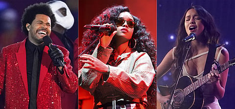 The Weeknd was named global artist of the year at the Apple Music Awards, H.E.R. was named songwriter of the year, and Rodrigo was named breakthrough artist of the year among other awards. (AP)