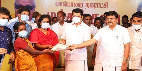 Tamil Nadu Electricity Minister V Senthil Balaji distributes pattas. (Photo| Twitter)