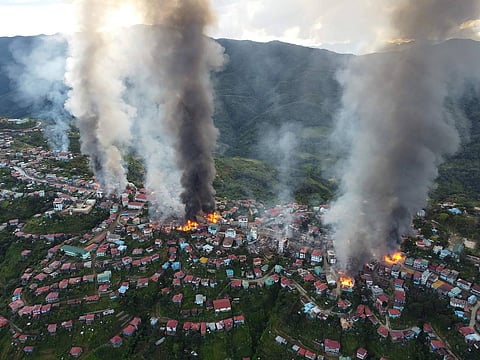 In this photo released by the Chin Human Rights Organization, fires burn in the town of Thantlang in Myanmar's northwestern state of Chin, on Friday Oct. 29, 2021. (From AP)