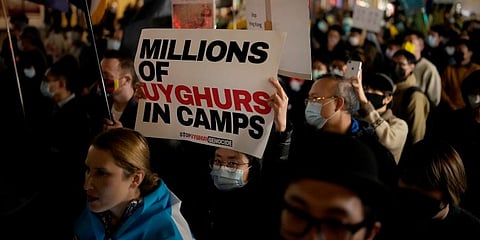 Demonstrators supporting Tibetans, Uyghurs and Hong Kongers take part in a protest against the Chinese Communist Party in London. (Photo | AP)