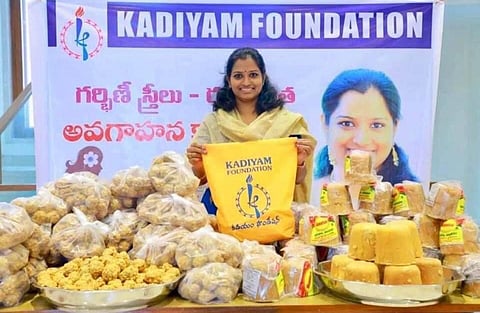 Kadiyam Foundation's Dr Kavya with food kits and jaggery. (Photo | Express)
