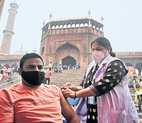 A health worker administers COVID-19 vaccine at a camp at Jama Masjid | Parveen negi