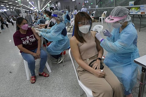 Health workers administer shots of the AstraZeneca COVID-19 vaccine at the Central Vaccination Center in Bangkok, Thailand. (File Photo | AP)