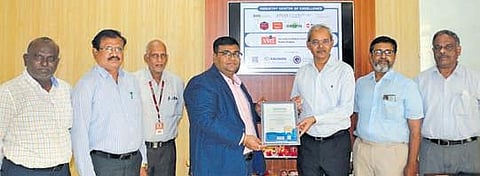 VVIT chairman Vasireddy Vidya Sagar, and Eduskills CEO Shubhajith Jagadev exchange the MoU
