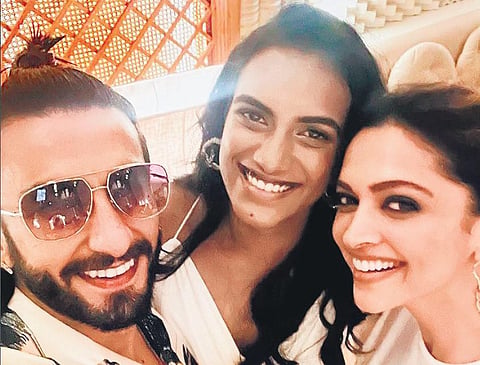 Olympic medallist PV Sindhu with Hindi film actors Deepika Padukone and Rnaveer Singh