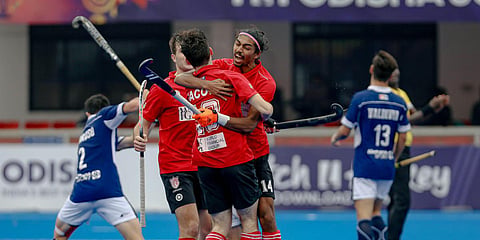 Canadian hockey team celebrates its victory over Chile at the FIH Junior Men's Hockey World Cup. (Photo| PTI)