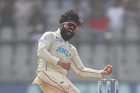 New Zealand's Ajaz Patel celebrates the dismissal of India's Mohammed Siraj during day two of their second test cricket match. (Photo | AP)
