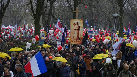 Thousands of demonstrators march in Utrecht, Netherlands, Saturday, Dec. 4, 2021, to protest against COVID-19 restrictions and the lockdown. (Photo | AP)