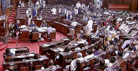 Opposition members walk out of the Rajya Sabha during the Winter Session of Parliament, in New Delhi. (File Photo | PTI)