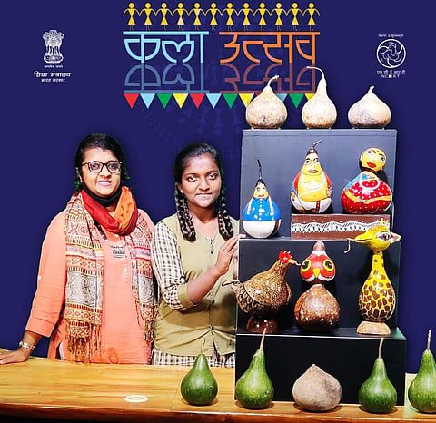 Chandana and her art teacher Sangeetha with the art works (Photo | Special arrangement)