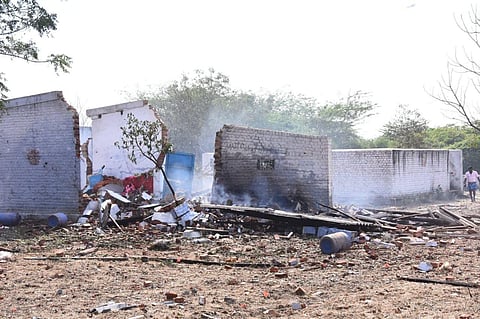 A view of the working sheds seen damaged following the blast that was triggered at a cracker unit at Achankulam village near Sattur in Virudhunagar district. (Photo | EPS)