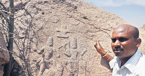 Monappa Shirwal with an inscription at Shirwal village of Shahapur taluk in Yadgir district