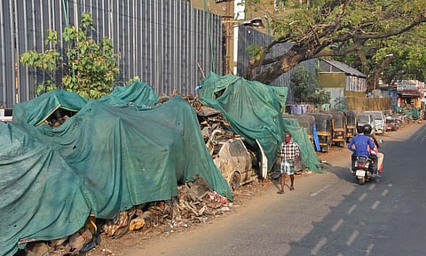 The seized vehicles dumped beside the old building of Thampanoor police station opposite Kairali Theatre. (Photo | B P Deepu, EPS)