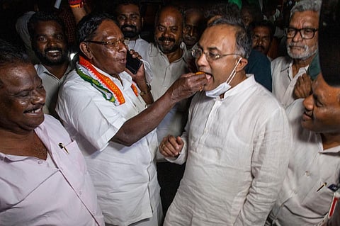 Puducherry Chief Minister V Narayansamy with party cadres and leaders celebrating the removal of Lt Governor Kiran Bedi on Tuesday at the party office. (Photo | G Pattabi Raman, EPS)