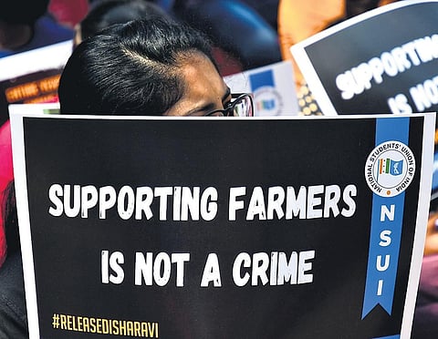 Members of NSUI hold placards condemning the arrest of Disha Ravi, in Bengaluru on Tuesday | shriram bn