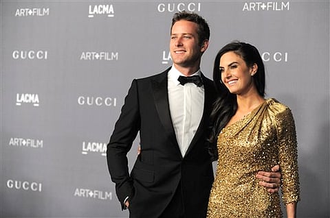 Armie Hammer, left, and Elizabeth Chambers (Photo | AP)