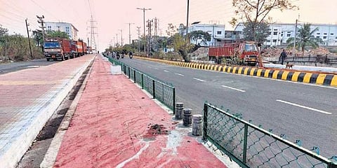 Barricades erected along cycle track at Patia in Bhubaneswar. (Photo | ESP)