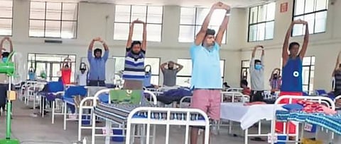 Representative image of patients performing yoga at a Covid Care Centre