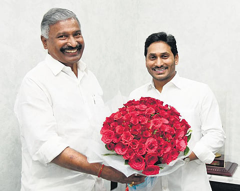 CM YS Jagan Mohan Reddy greeting Panchayat Raj Minister Peddireddy Ramachandra Reddy at CM’s camp office in Tadepalli on Monday. (Photo | EPS)