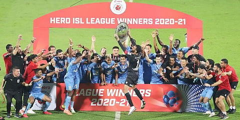 Mumbai City FC players celebrate with the League Winners Shield after winning 2-0 against ATKMB (ISL) (File Photo)