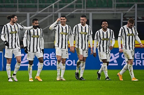 Juventus' forward Cristiano Ronaldo (3rdL) celebrates after scoring his goal during the Italian Cup semifinal first leg football match against Inter Milan at San Siro stadium in Milan. (Photo | AFP)