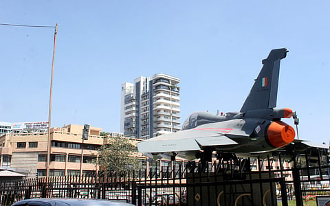 A plane at the circle opposite the Hindustan Aeronautics Limited headquarters in Bengaluru. (File Photo | EPS)