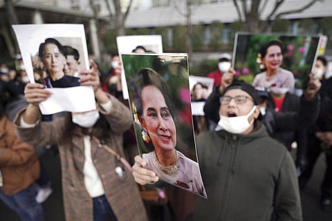 Burmese living in Japan and supporters hold pictures of Myanmar leader Aung San Suu Kyi during a protest in front of the Foreign Ministry in in Tokyo Wednesday, Feb. 3, 2021. (Photo | AP)